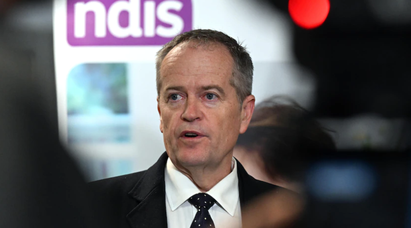 Government brings forward planned NDIS review, urges bigger focus on disability scheme's benefits