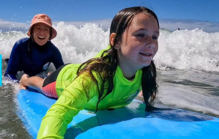 Surf therapy improves lives of children with disability, neurodiversity on NSW South Coast