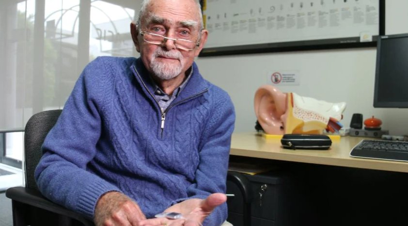 Bionic ear surgeon who helped deaf children hear gets own cochlear implant